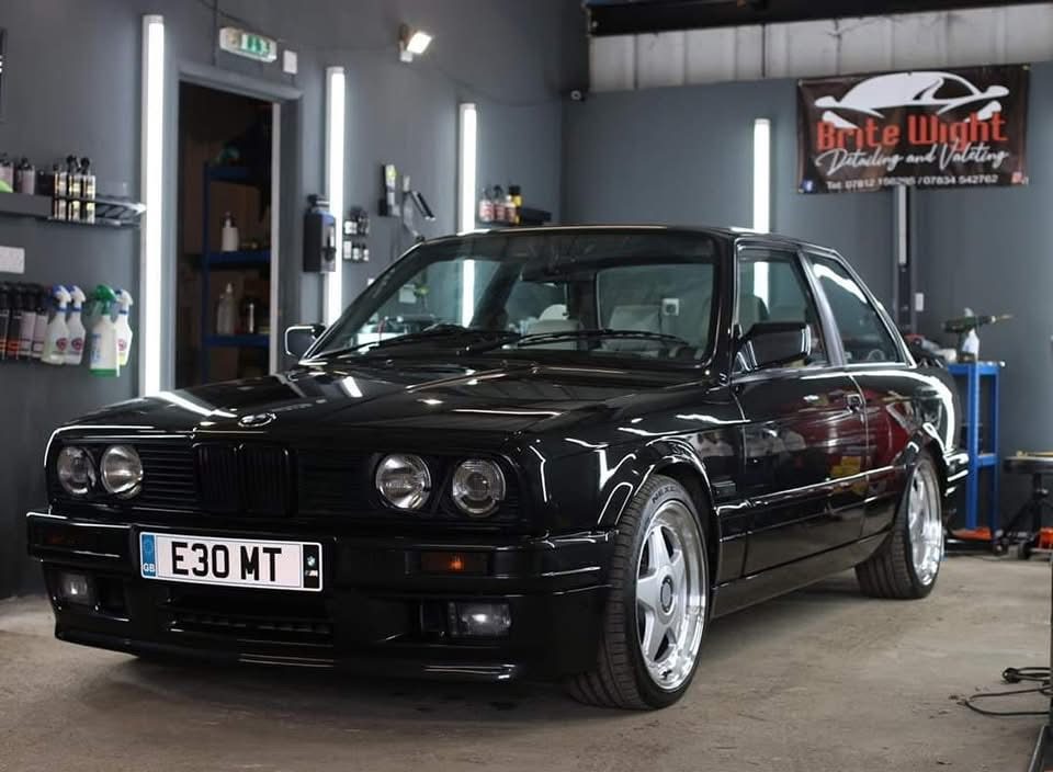 Ceramic-coated black BMW with deep gloss